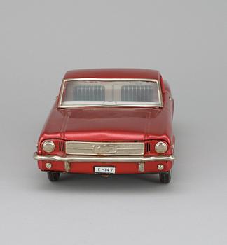 A Japanese Nomura Toys Ford Mustang, 1960s.