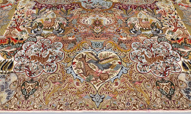 A Kashmar carpet, approx. 391 x 393 cm.