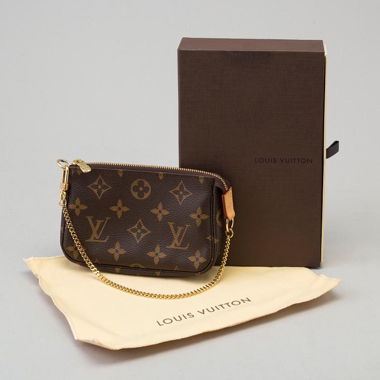 a LOUIS VUITTON small bag/pouch.
