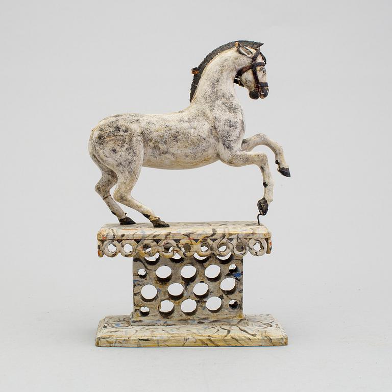 A painted folk art horse figure 19th century.