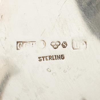Two silver beakers and a bowl,