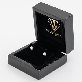 Earrings, a pair, 18K white gold set with round brilliant-cut diamonds totalling 1.03 ct, accompanied by a GIA dossier.