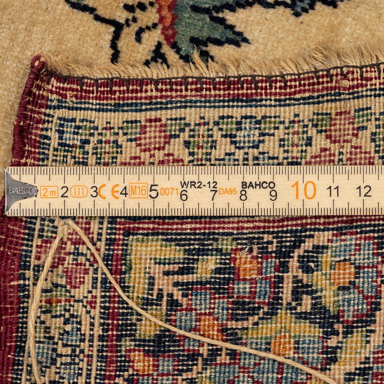 An antique Kerman Raver rug, South Persia, signed c. 238 x 143 cm.