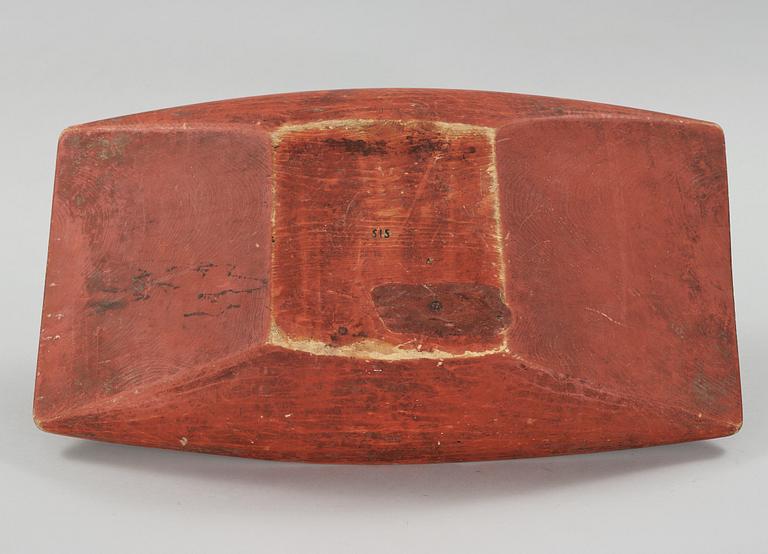 A wooden bowl from the 19th century.