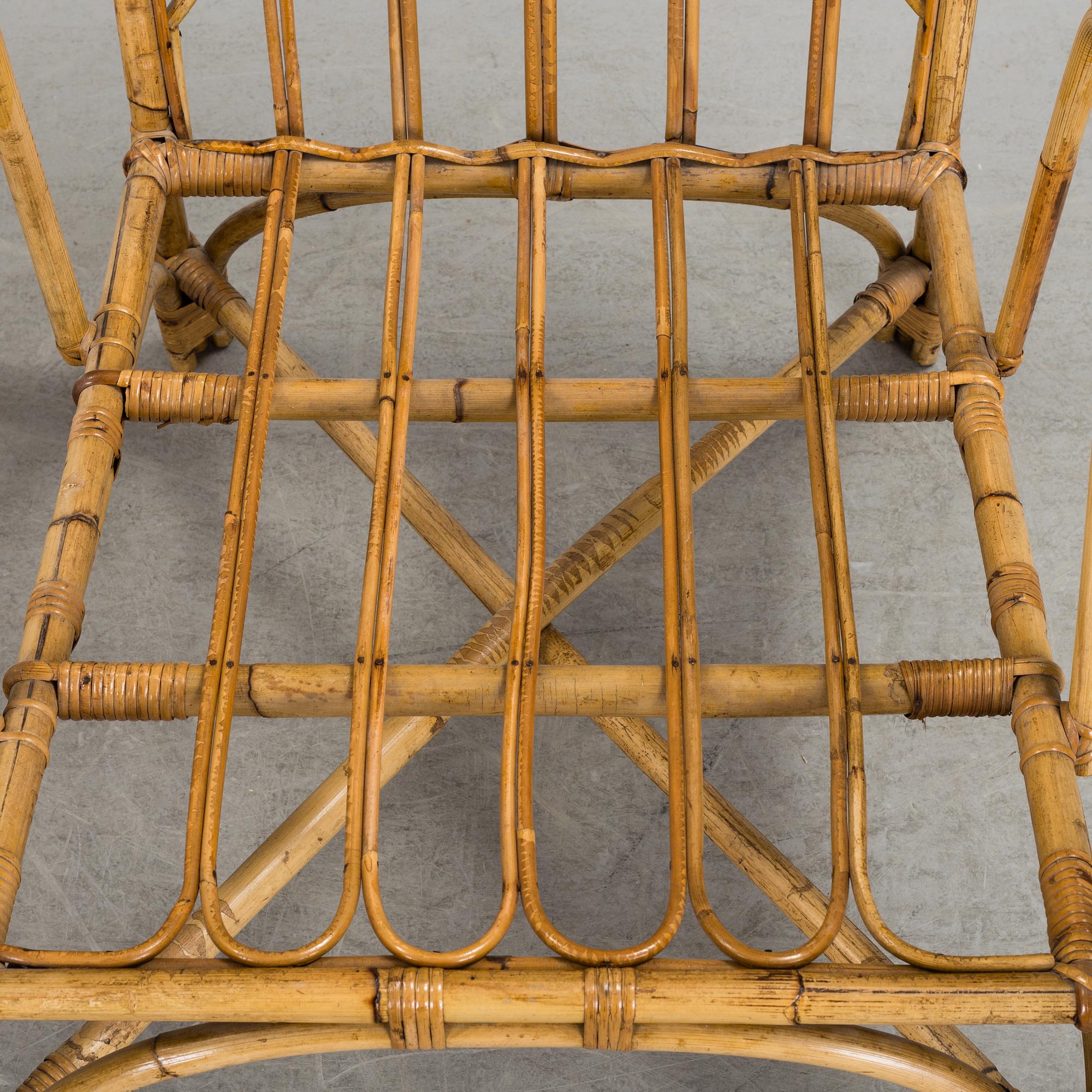 A pair of Garden Armchairs with one stool, mid 20th century.