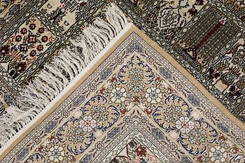 An Oriental silk rug, approx. 122 x 79 cm.