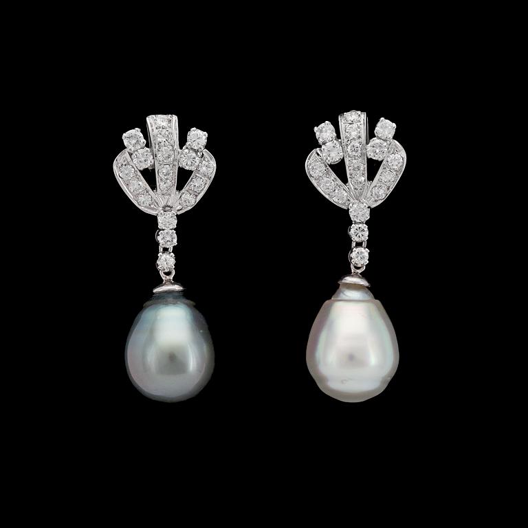 A pair of cultured South sea and Tahiti pearls and diamond earrings, tot. 1.40 cts.