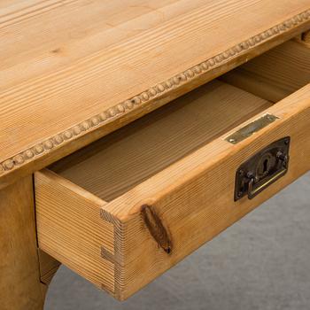 A 20th century rococo style writing desk.