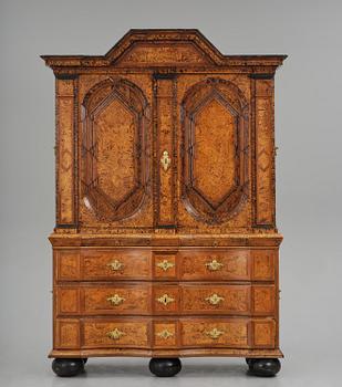 A Swedish late baroque burr-alder cabinet, first part 18th century.