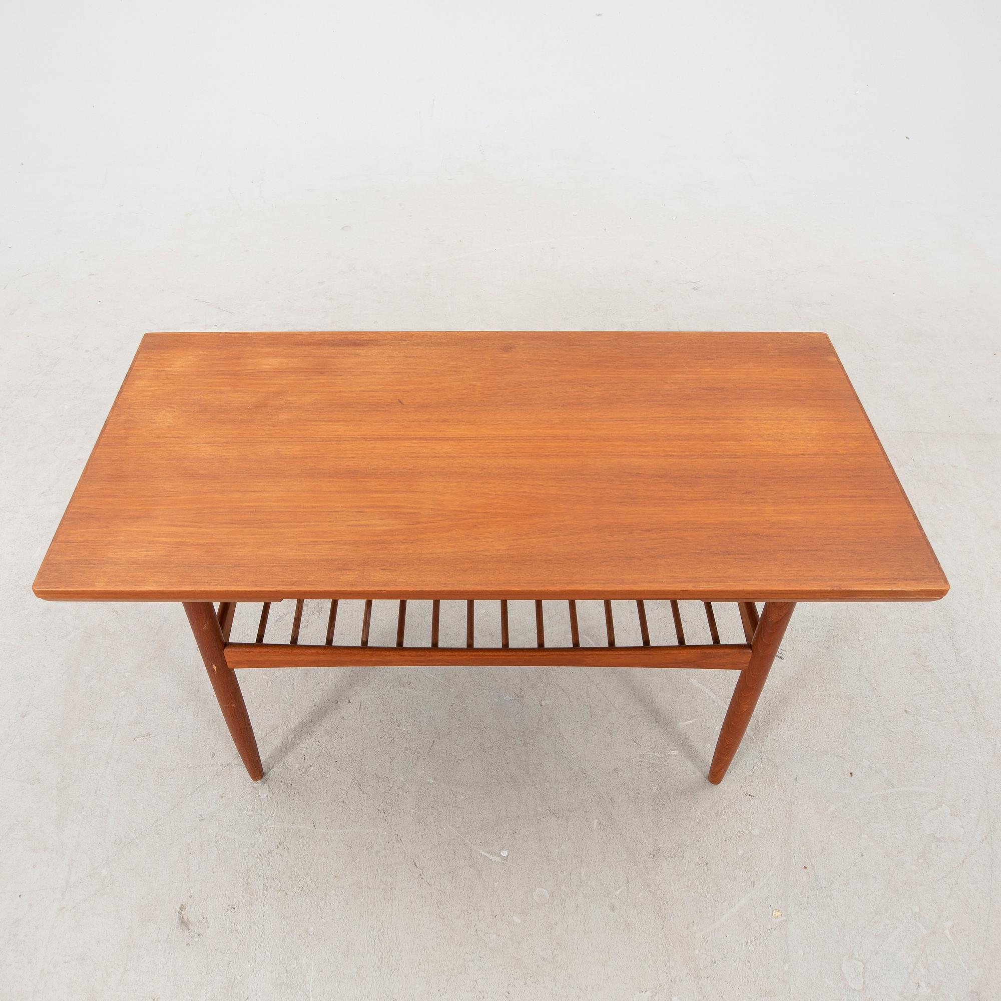 A mid 1900s Danish teak coffee table.
