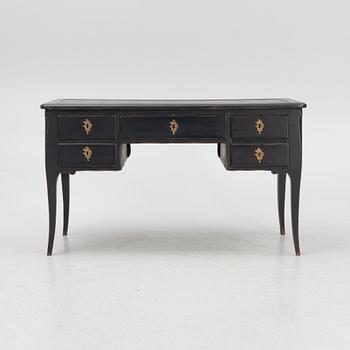 A French Rococo style desk, 20th Century.