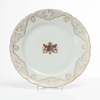 A group of three armorial dinner plates, presumably France, late 19th century.