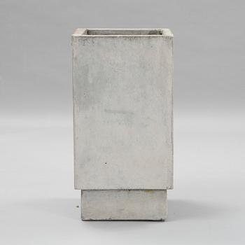 A contemporary concrete flowerpot.