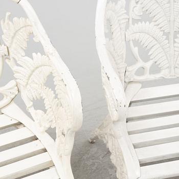 A pair of painted aluminum armchairs, second part of the 20th Century.