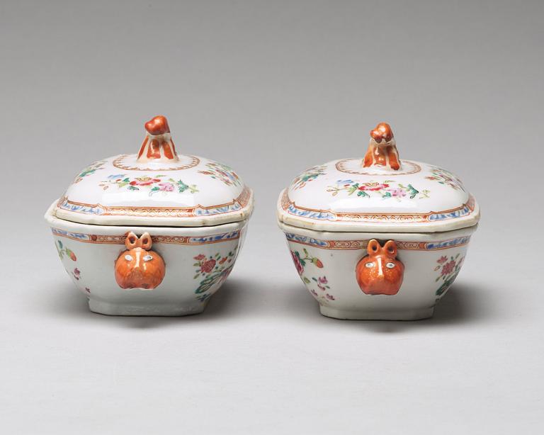 A pair of famille rose 'double peacock' butter tureens with covers and stands, Qing dynasty, Qianlong (1736-95).