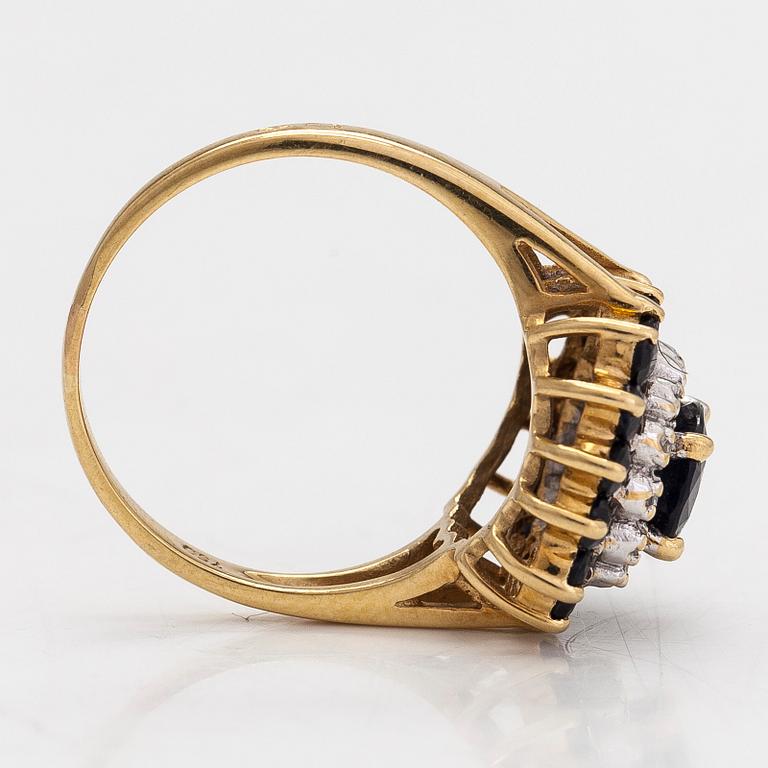 An 18K gold ring with sapphires and diamonds ca 0.14 ct in total. Unclear hallmarks.