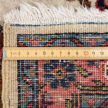 A semi-antique Tabriz carpet, c. 282 x 198 cm.