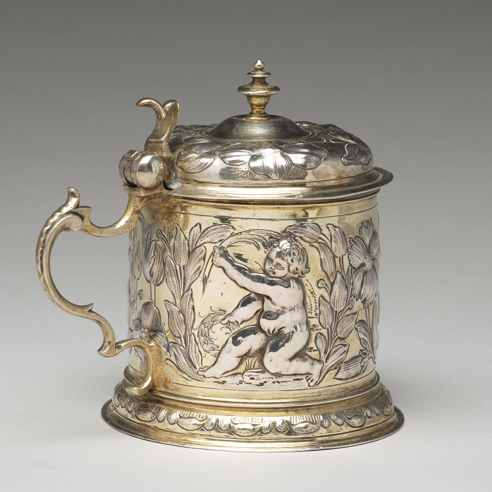 A German 17th century parcel-gilt silver tankard, mark of Hans Leonhard Huber, Augsburg (1637-1671).