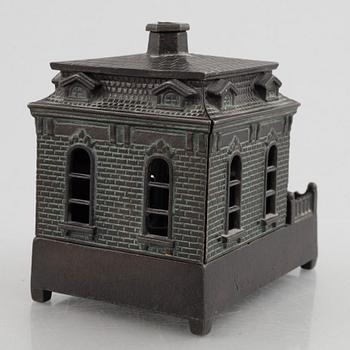 A mechanical bank, late 19th century, probably by Judd Manuf. Comp.