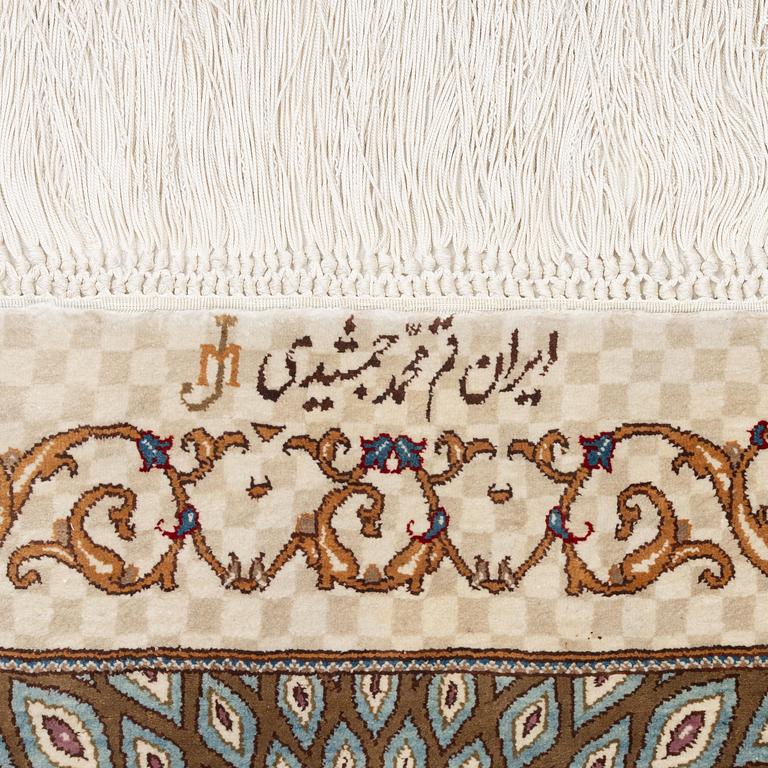 A silk Qum, Central Persia. signed Mohammad Gamshidi, c. 203 x 126 cm.