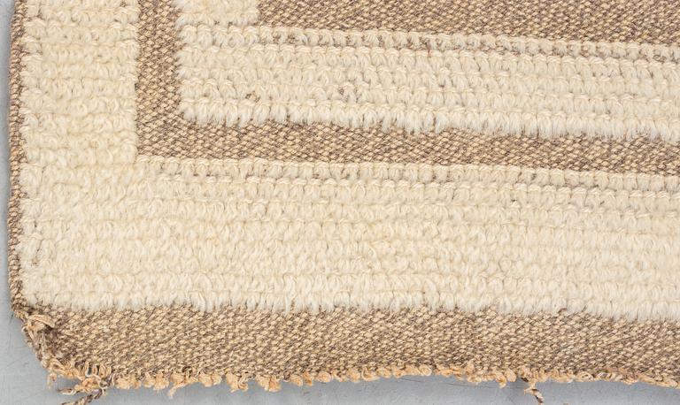 a carpet, knotted pile in relief, ca 187,5-189,5 x 96,5-100 cm, signed and dated S.K.L.H. 1945 at the back.