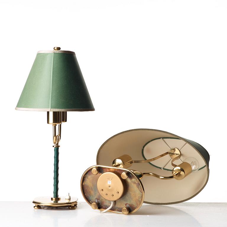 Josef Frank, a pair of brass and green leather table lamps, Svenskt Tenn, model 2388.