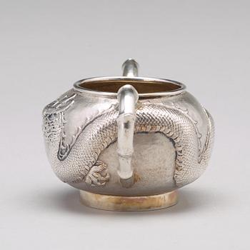 A Chinese four piece silver tea set, Luen Wo, Shanghai, 1875-1925.