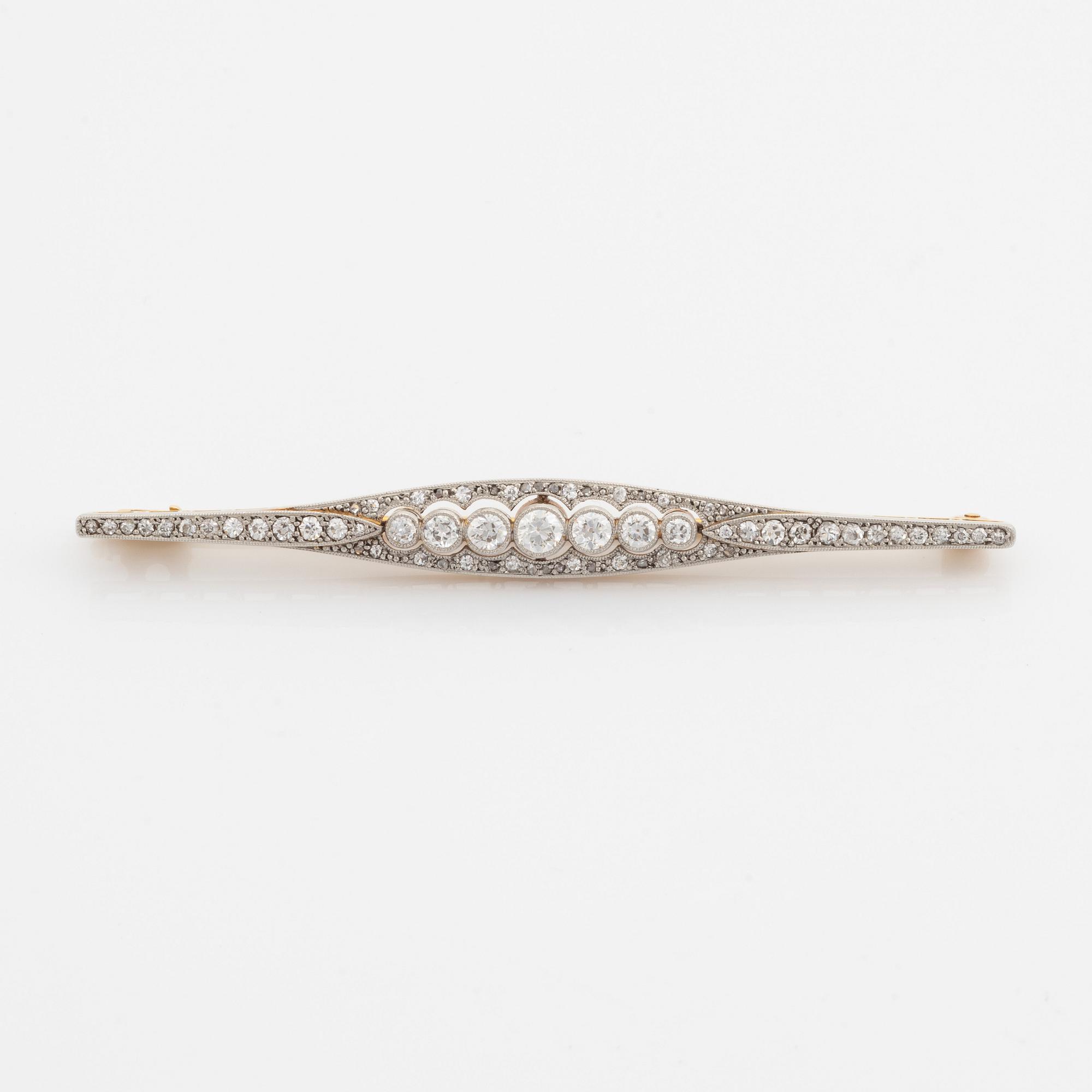 Diamond brooch.