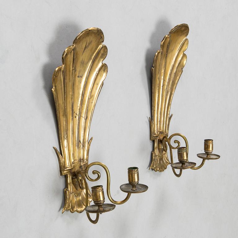 Paavo Tynell, a pair of 1920's brass wall sconces, model '7004S', for Taito Finland.