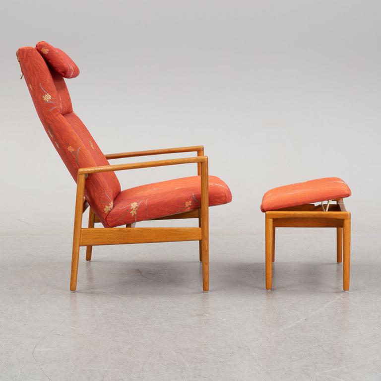 A 1950's/60's lounge chair and foot stool.