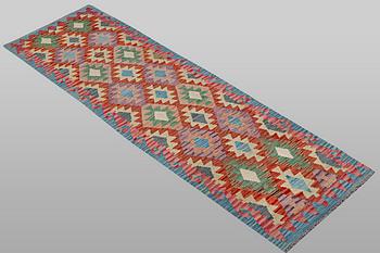 A runner carpet, Kilim, ca 269 x 77 cm.