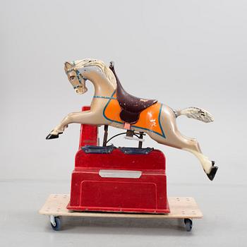 A motorized fiberglass horse probably 1970s.