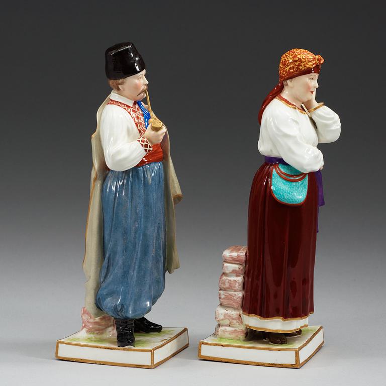 Two Russian figures of peasants, Popov, 19th Century.