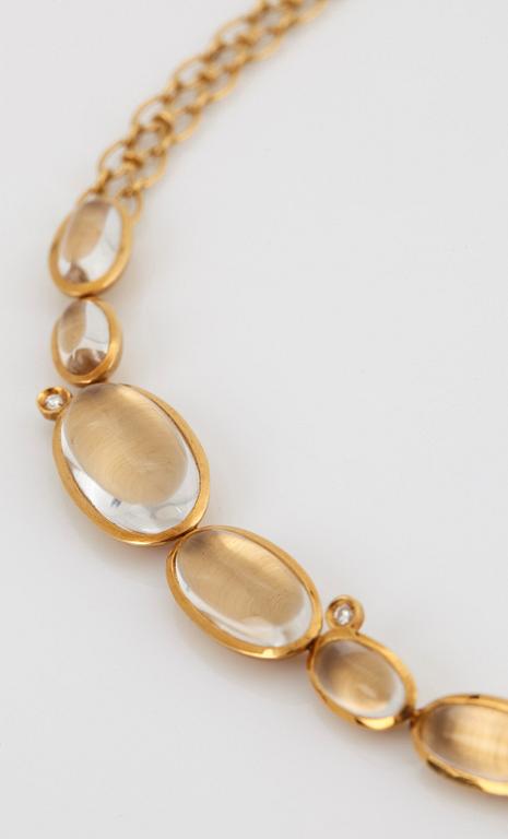 An H Stern "Justine" 18K gold necklace set with cabochon-cut rock crystal.