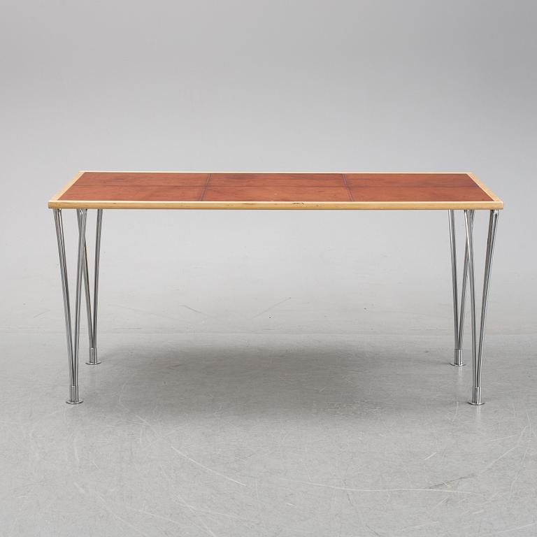 A birch and leather dining table produced by Mathsson International, 21th century.