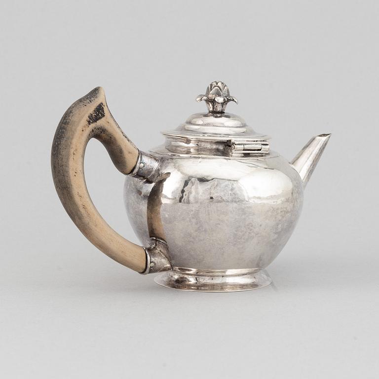 A Swedish Rococo silver tea-pot, mark of Jonas Thomasson Ronander, Stockholm 1756.