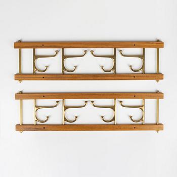 A pair of 'Dekorativ' teak coat hangers, Skoglunds metallgjuteri, Anderstorp, 1950's/60's.