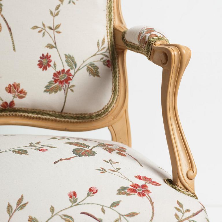 A Louis XV armchair.