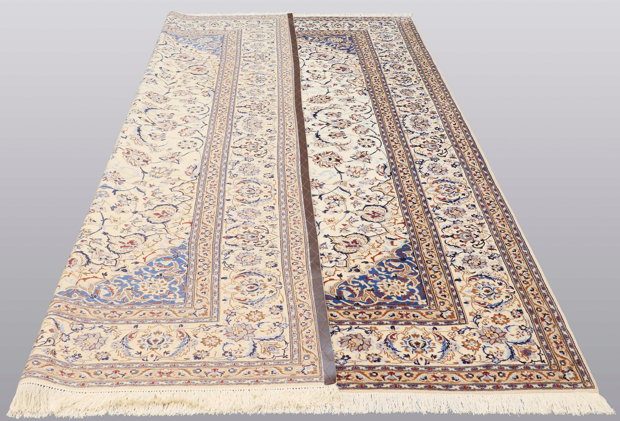 A carpet, Nain part silk, 361 x 262 cm.