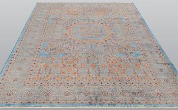 An oriental carpet with a Mamluk pattern, ca 299 x 210 cm.