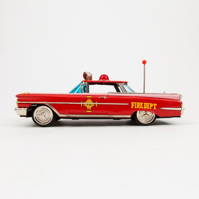 A tinplate Ichiko "Fire Dept Chief's car" Oldsmobile, Japan, 1960s.