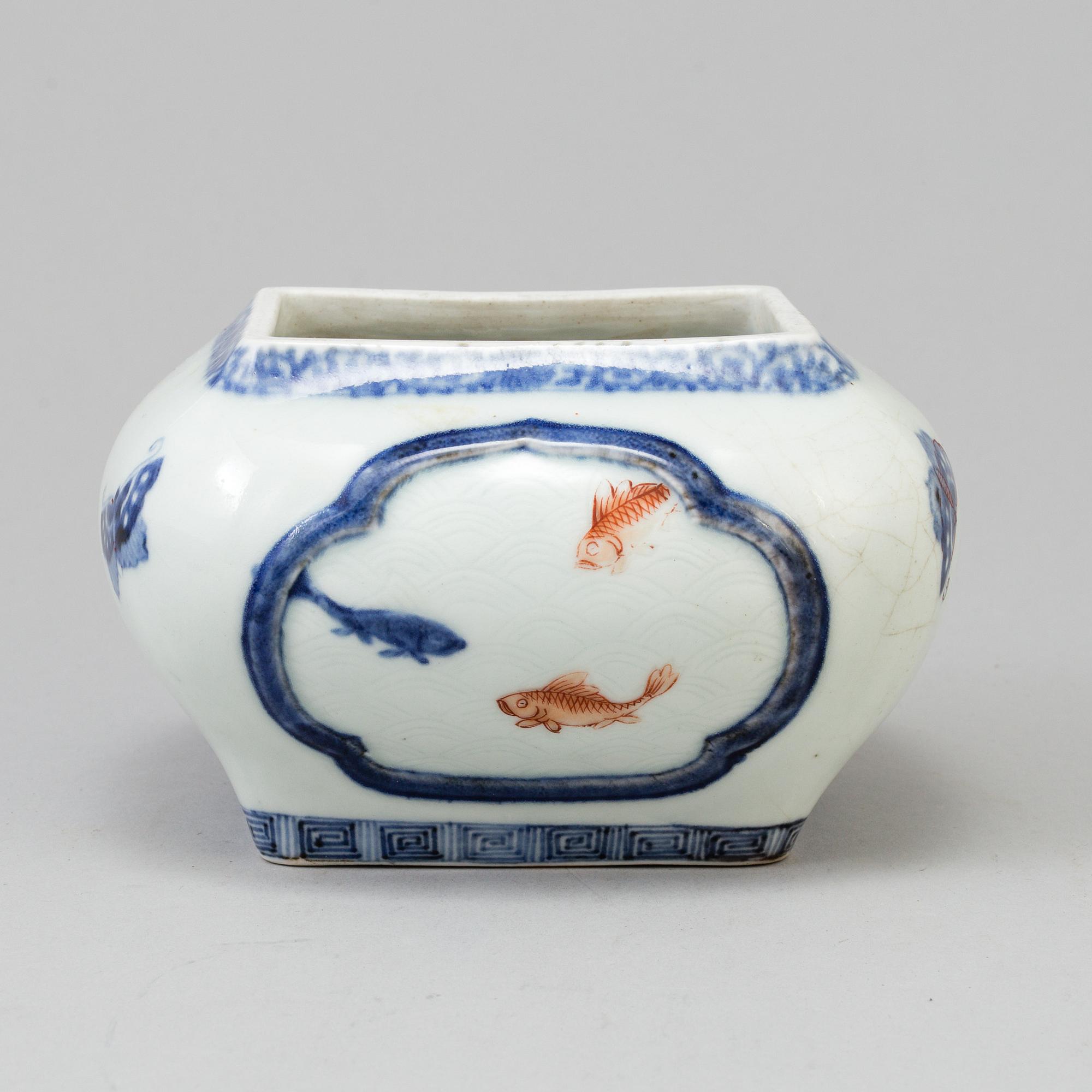 A Chinese underglazed blue and white with iron red porcelain pot, 20th century.