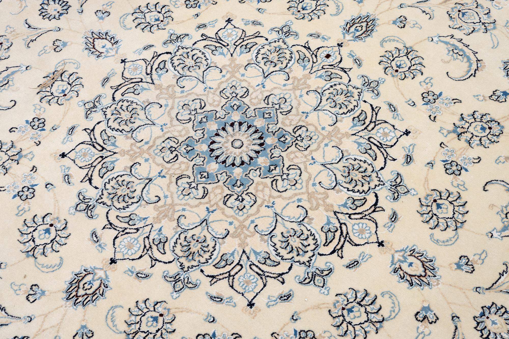 A Nain rug, diameter a. 247 cm.