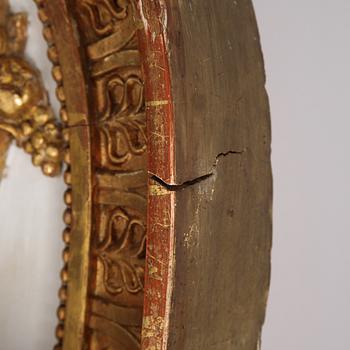 An Swedish Empire mirror, first half of the 19th century, attributed to Petter Gustaf Bylander, (Gothenburg 1802-59).