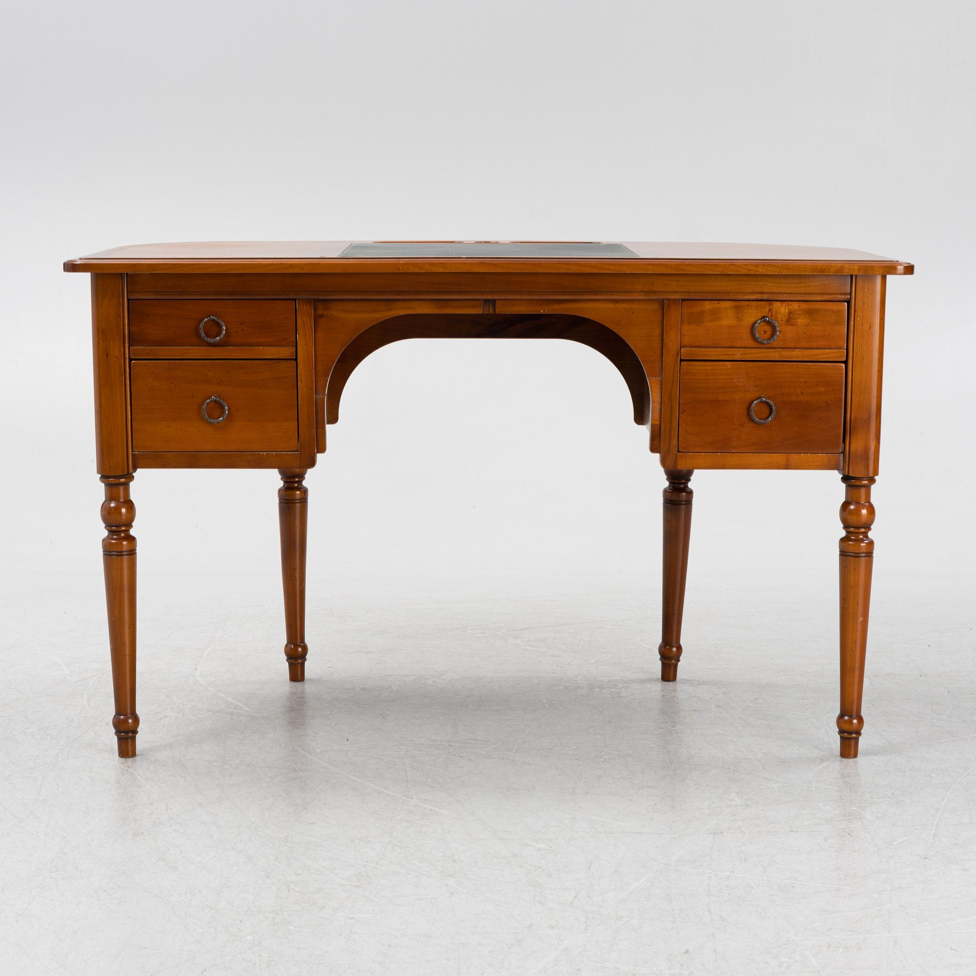 A Cherry wood desk, mid 20th century.