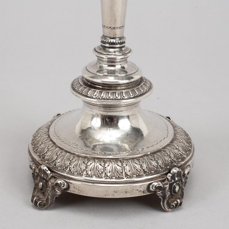 A pair of swedish silver candlesticks, mark of Guldsmedsaktiebolaget GAB, Stockholm 1882.