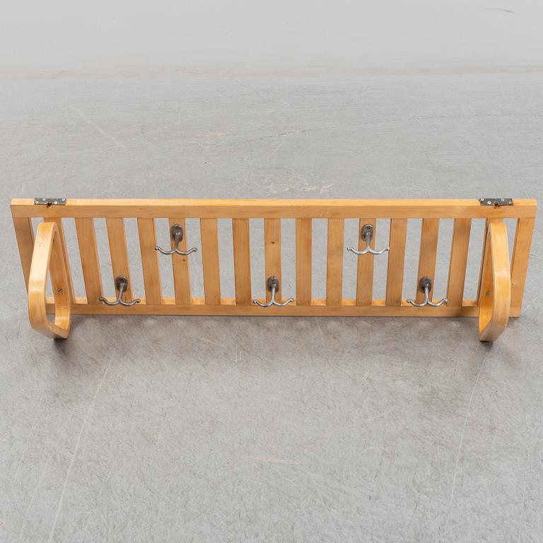 A mid 20th century Alvar Aalto shelf.