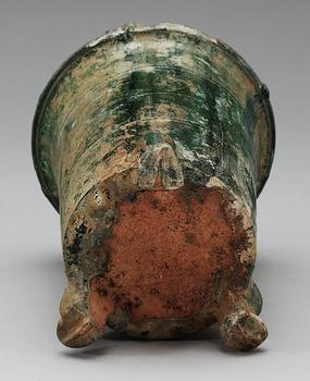 A green glazed pottery silo, Han dynasty (206 BC - 220 AD).