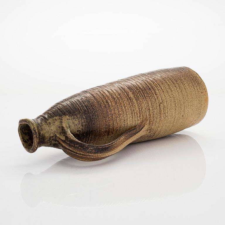 Kyllikki Salmenhaara, a stoneware jug signed KS Arabia.