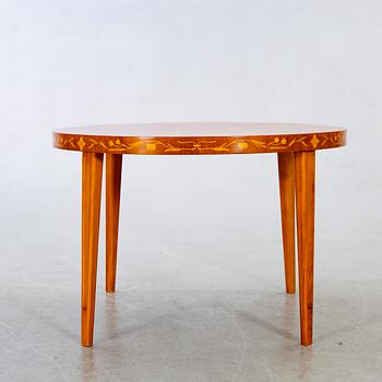 A Swedish modern coffee table bt Kocks Trelleborg 1940's.